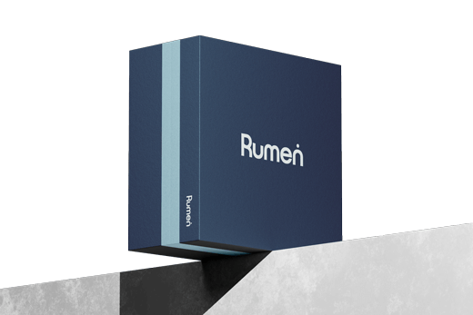 A dark blue box with the word "Rumen" in white text is balanced on an edge against a plain background.